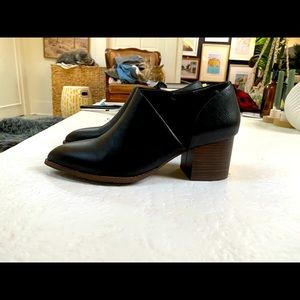 BC Footwear barely worn vegan leather booties. Cutout on one side. Chic!